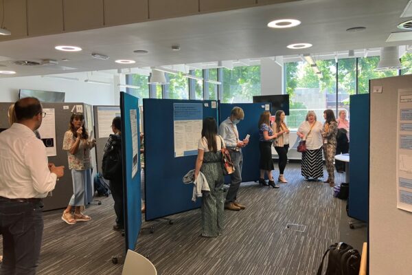 Delegates in poster exhibition area Delegates in poster exhibition area